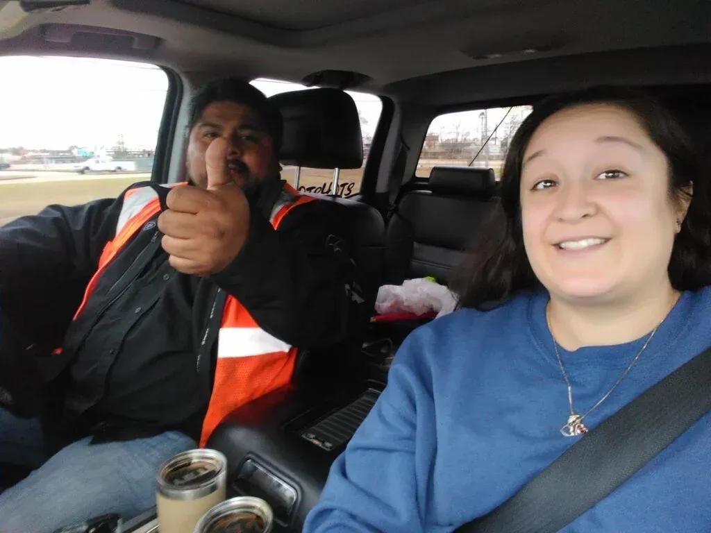 Claudia and Israel Nava of I-Nava Hotshots LLC in the cab of their truck