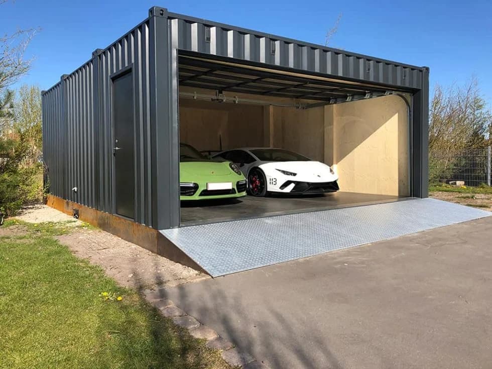 Yellow shipping container at an automotive yard