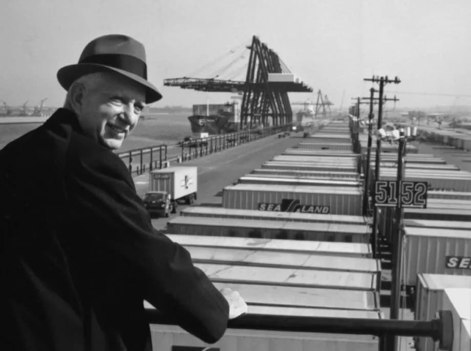 Malcolm McLean inspecting one of the first standardized shipping containers.