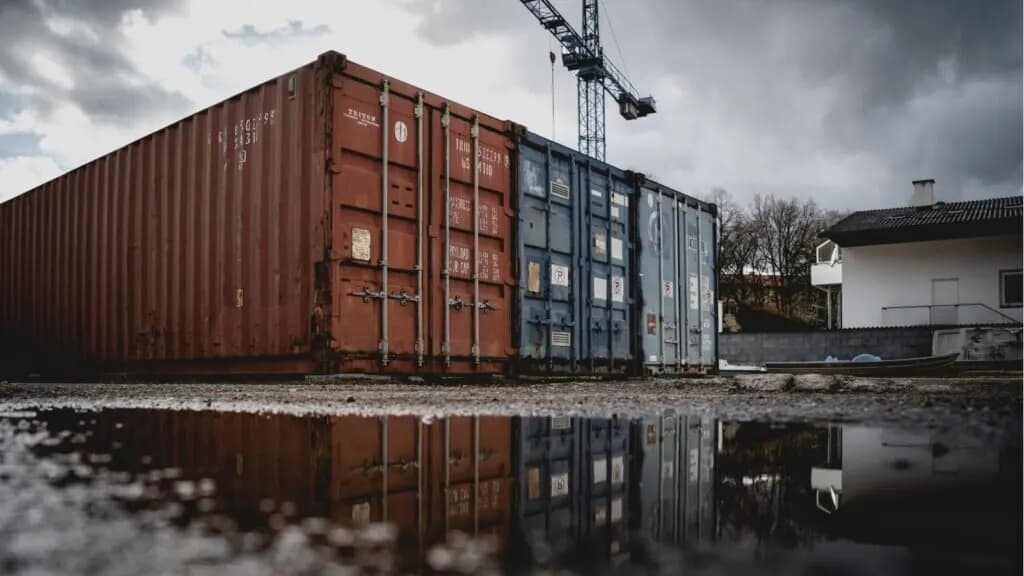 The exterior of a luxury shipping container home.