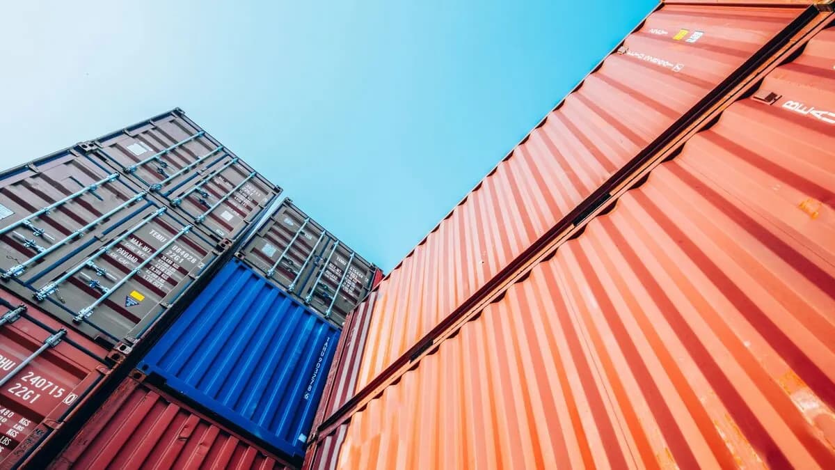 Shipping containers stacked on top of each other.