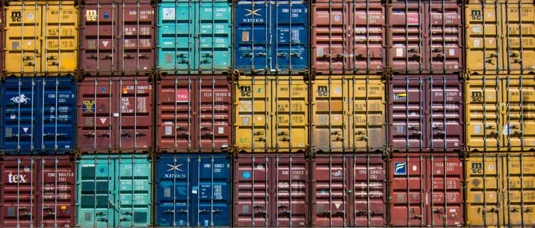 A diagram of standard shipping container sizes with key dimensions called out.