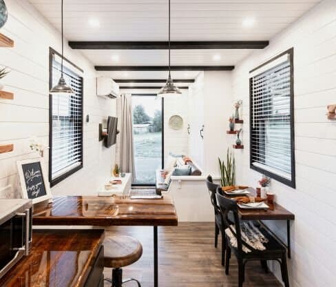 Shipping container home with floor-to-ceiling windows