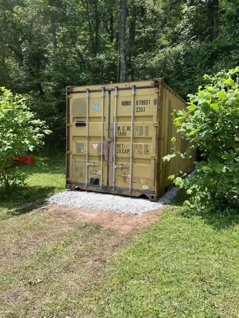 Bruce and Linda's used shipping container, photographed in their backyard.